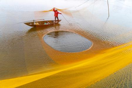 Fisherman working on the nets 