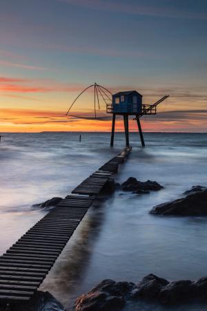 Stilt fishing hut at sunrise, Pornic, France