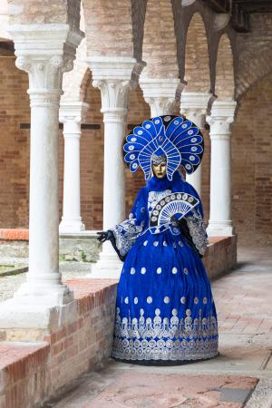 Lady in blue among the cloisters