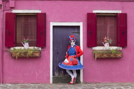 The lady and the pink house